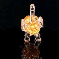 Gold in an Elephant Bottle