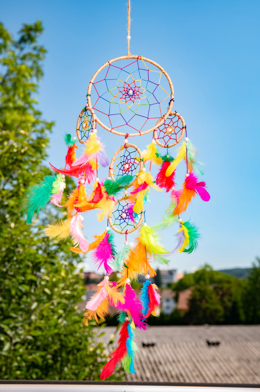 Dreamcatcher with colourful feathers